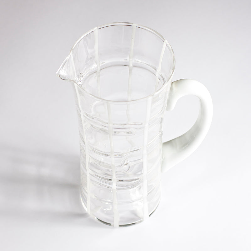clear blown glass jug