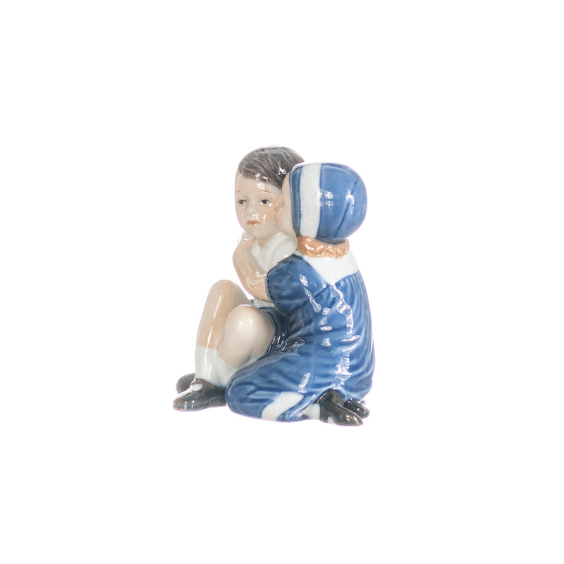 figurine hugging children in hand decorated porcelain