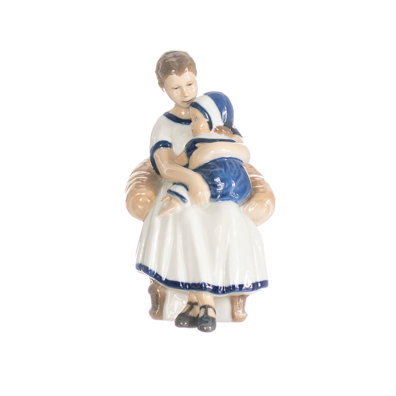 little girl with mother figurine in hand decorated porcelain