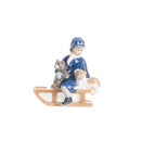 little girl figurine on sleigh in hand decorated porcelain
