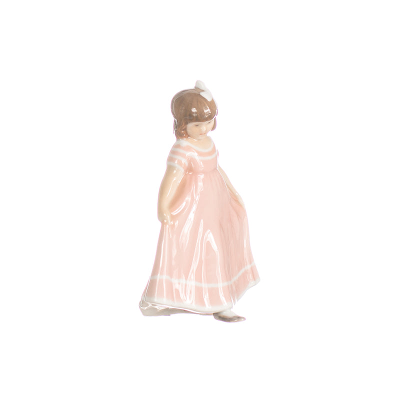 pink girl figurine in hand decorated porcelain