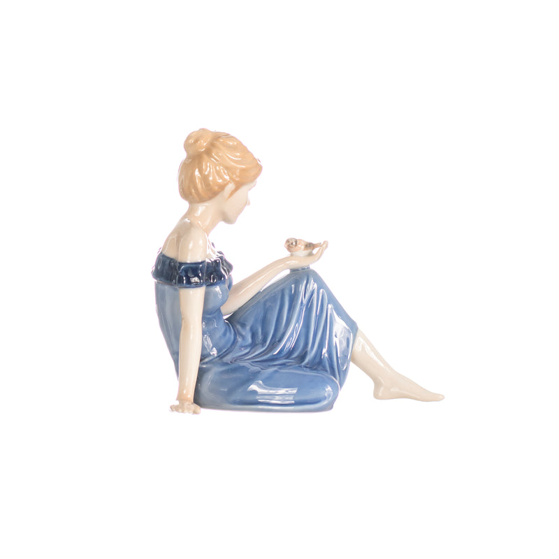 figurine young woman with sparrow in hand decorated porcelain