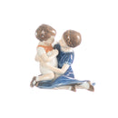 statuina coppia bimbi in porcellana decorata a mano