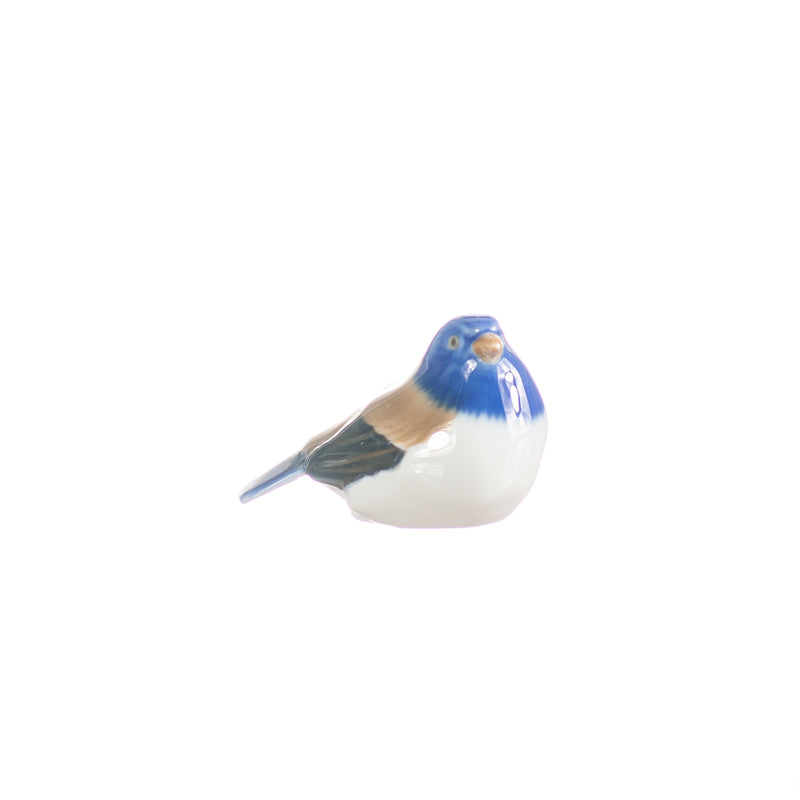 little bird resting in hand decorated porcelain